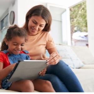 adult and child reading together