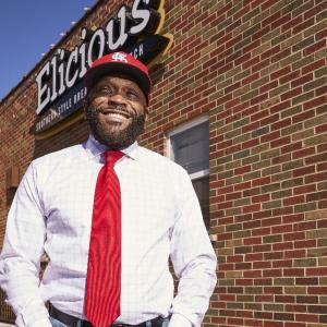 Little outside his restaurant.