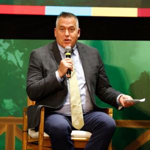 Dan Lambe, CEO of the Arbor Day Foundation, speaks on stage during the First International Green Cities Conference at FAO's headquarters in Rome, Italy. 