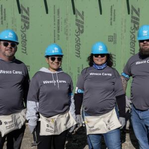 Wesco volunteers working at the Jimmy and Rosalynn Carter worksite.