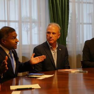 3 people having a meeting