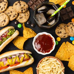Image showing processed foods: cookies, hot dogs, candy, cheese and cookies.