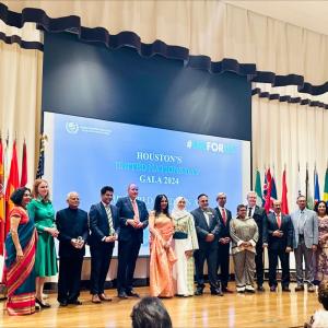 A large group of people stood in a line at Houston's United Nations Day Gala 2024 