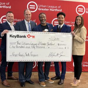 Leadership from the Urban League of Greater Hartford shown with a $150,000 check from KeyBank.