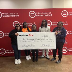 Members of the Urban League of Greater Hartford shown with a $150,000 grant check.