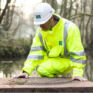 person working on water utility