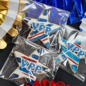 Individually wrapped star-shaped cookies with VPP on them.