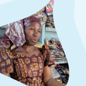 A person stood in front of a shelf 