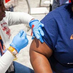 A person receiving a vaccination