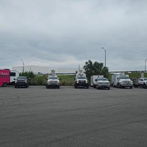 Vehicles parked up side by side 