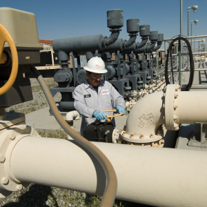 worker with water pipes