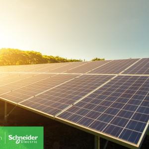 Sunsetting behind a solar farm