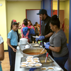 volunteers serving food