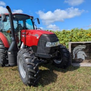 red tractor outside in field