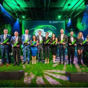 Merck KGaA, Darmstadt, Germany, employee Shaun Russell (third from right) accepts the Sustainability Excellence Award for the company at the World Sustainability Congress in The Netherlands.