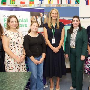 STAMFORD, Conn., September 16, 2025 – Marissa Weidner, Chief Corporate Responsibility Officer at Webster Bank (fifth from left) and Nancy Kail¸ Executive Director, CT Financial Scholars (first from left) and Stamford Mayor Caroline Simmons (fourth from left) are joined by Stamford High School students, educators and Webster Bank staff to announce a three-year, $300,000 grant for CT Financial Scholars at an event earlier today at Stamford High School.