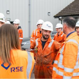 The apprentices speaking to each other.