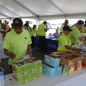 Alsip, IL team preparing food bags for local food pantry.