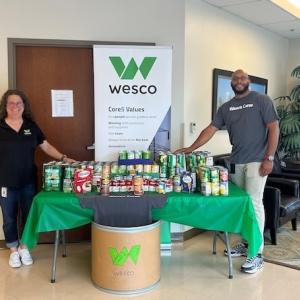 Wesco canned food donations and core values presentation.