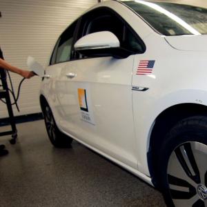 Person charging and electric car