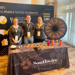 3 employees at a Southwire booth