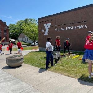 KeyBank volunteers working on the grounds outside of the William-Emslie YMCA.