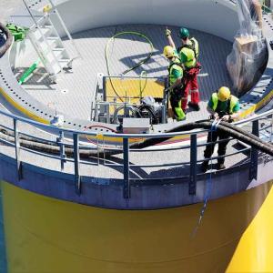 win turbine at sea under construction