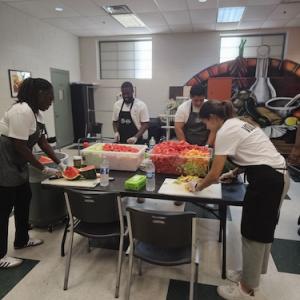 Team preparing food for the ceremony.