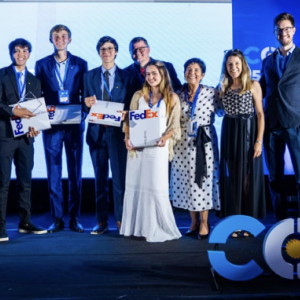 People stood in a line holding awards