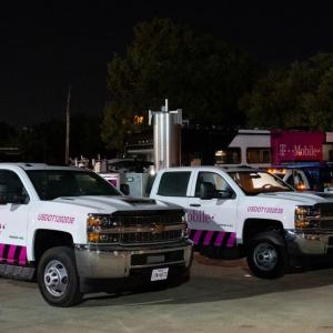 T-Mobile vehicles in parking lot