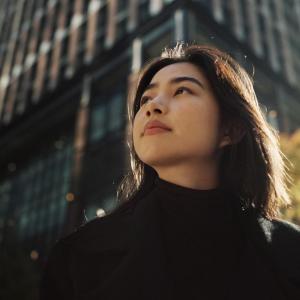Woman standing outside in a city