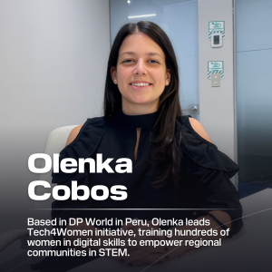 Olenka Cobos sitting at desk