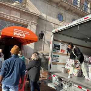 Bath & Body Works help unload a special delivery of Bath & Body Works personal care and home fragrance product donation to the YWCA’s Women’s Residency Program.