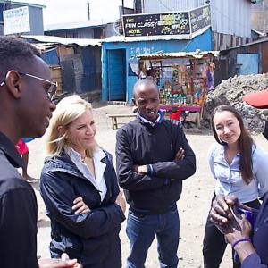 Laura Kohler talking to group on a Nairobi street