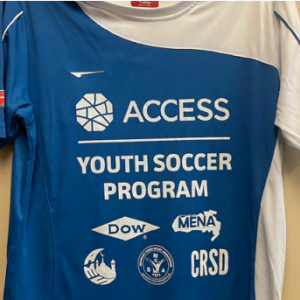 A soccer Jersey with "Access youth soccer program"