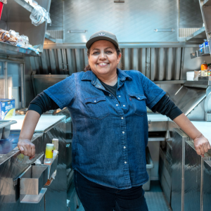 Person standing in a professional kitchen