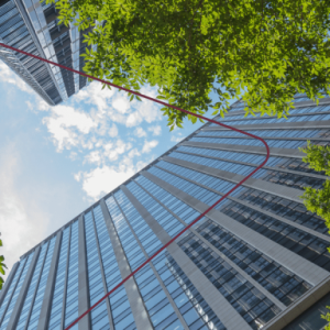 upward view of a tall building and trees