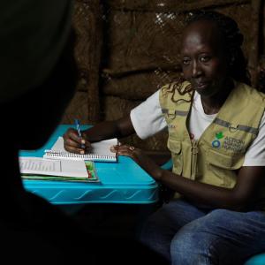 MET psycho-social support team leader, Susan, offers counselling to Adut Monywiir.