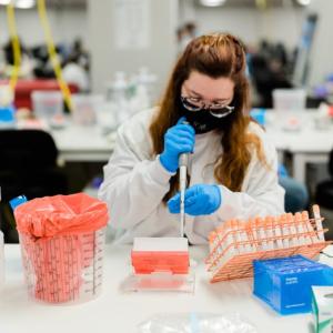 Aegis lab technician working with samples.