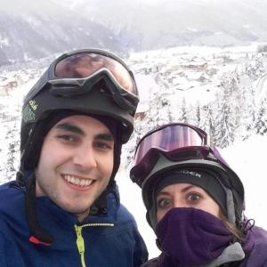 Evila Melgoza and husband skiing in mountains
