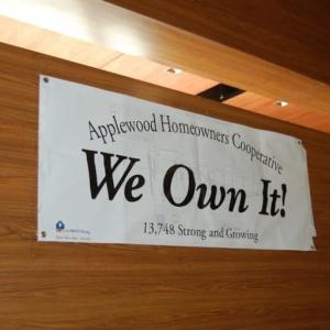 Applewood Homeowners cooperative banner: "We Own It".