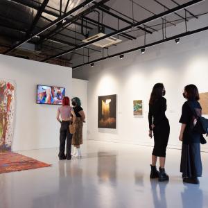 an art gallery with attendees