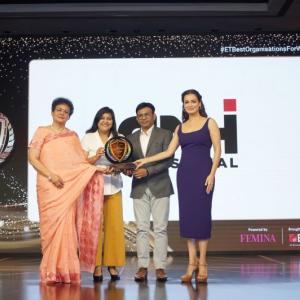 CNH Industrial India team holding trophy