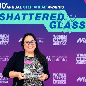  Tyra Woodruff in front of a "Step Ahead Awards, Shattered Glass" Background