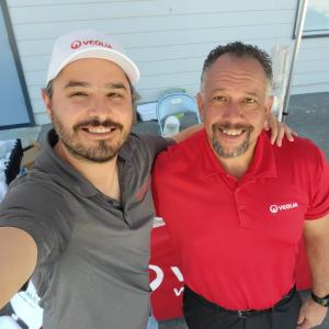 Two employees taking a 'selfie' at the event.