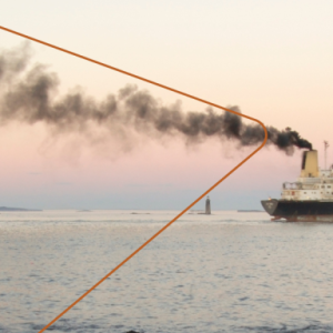 Ship with dark gray smoke coming out of smoke stack