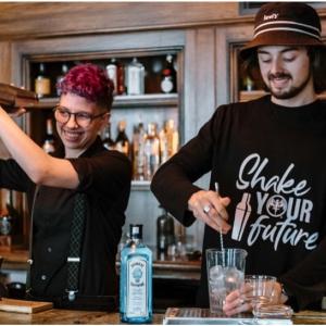 two bartenders practicing