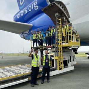 Clark team waving at camera