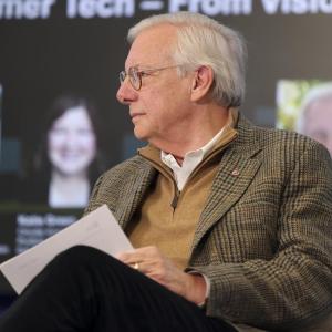 person sitting on a stage