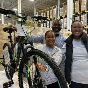 Volunteers with a bike